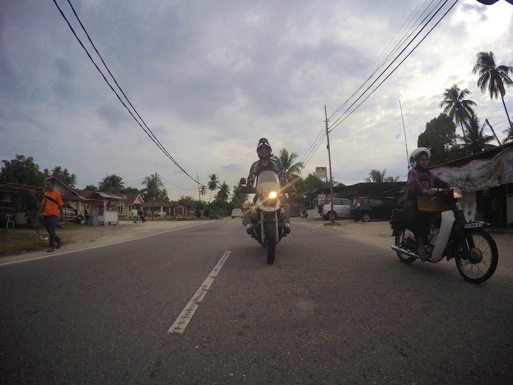 Riding through a small town in Penang